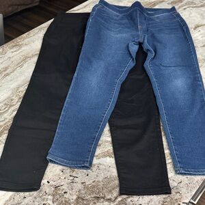 Women’s pull on denim and black pants both size large.